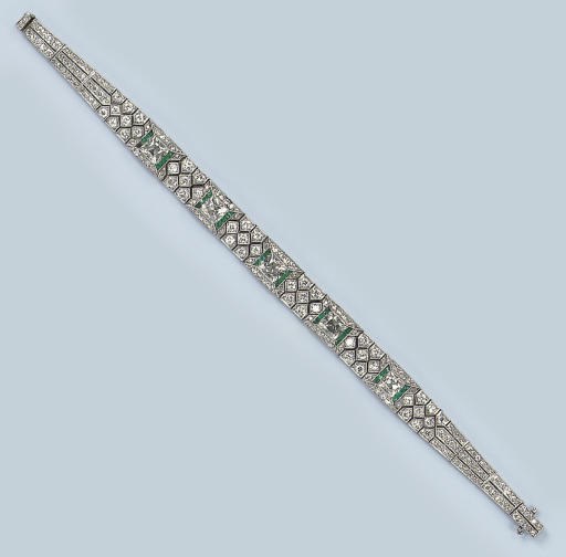 AN ART DECO EMERALD AND DIAMOND BRACELET