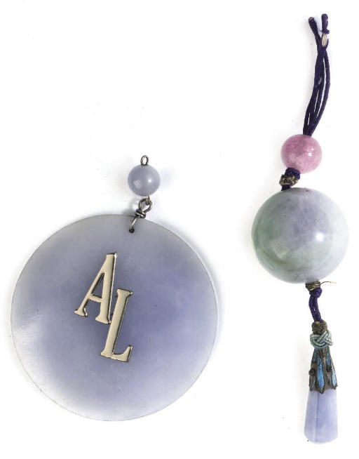 A JADEITE BEAD PENDANT AND A LAVENDER JADE PENDANT