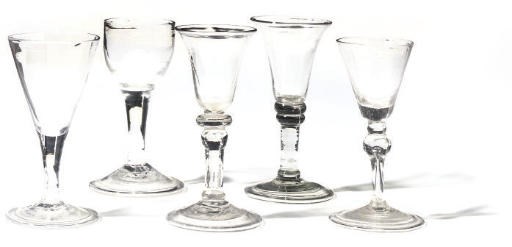 A GROUP OF FIVE WINE GLASSES