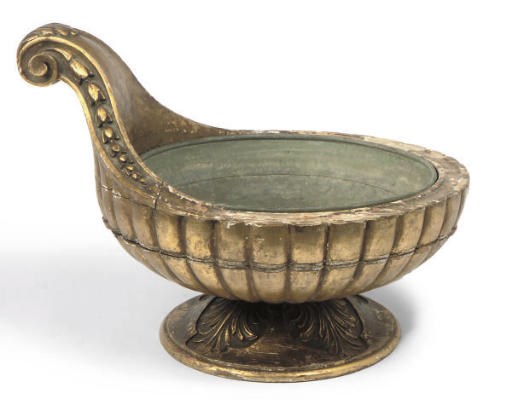 A CARVED GILTWOOD JARDINIERE