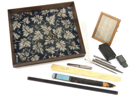 A SILVER-GILT AND ENAMEL MOUNTED TORTOISESHELL PAPER KNIFE AND A SILVER ENAMEL MOUNTED DESK CALENDAR