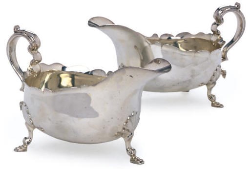 A PAIR OF VICTORIAN SCALLOPED SILVER SAUCE BOATS