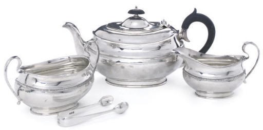 A GEORGE V THREE-PIECE SILVER TEA SERVICE