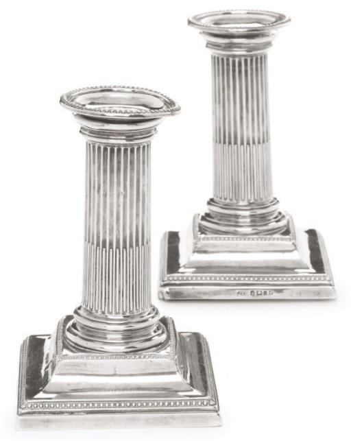 A PAIR OF VICTORIAN SILVER DWARF CANDLESTICKS