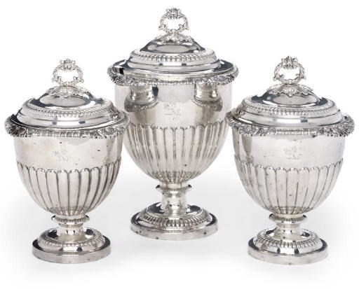 A SET OF THREE GEORGE III GILT-LINED SUGAR VASES AND COVERS