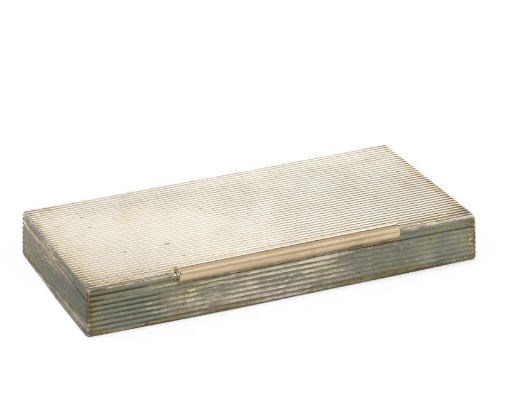 A SILVER CIGARETTE BOX BY CARTIER