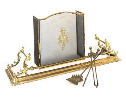 A GROUP OF BRASS HEARTH FURNITURE