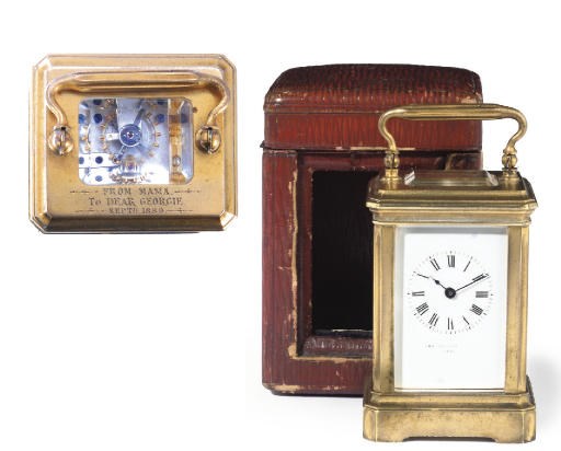 KING GEORGE V'S CARRIAGE CLOCK
A FRENCH MINIATURE EIGHT DAY CARRIAGE TIMEPIECE