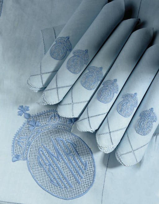 QUEEN MARY'S LINEN SET A PALE BLUE LINEN SET, CIRCA 1920