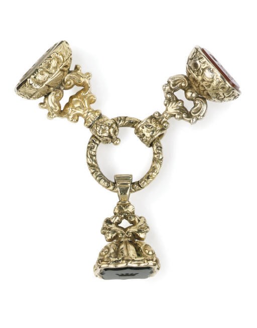 THREE GOLD CASED FOB SEALS