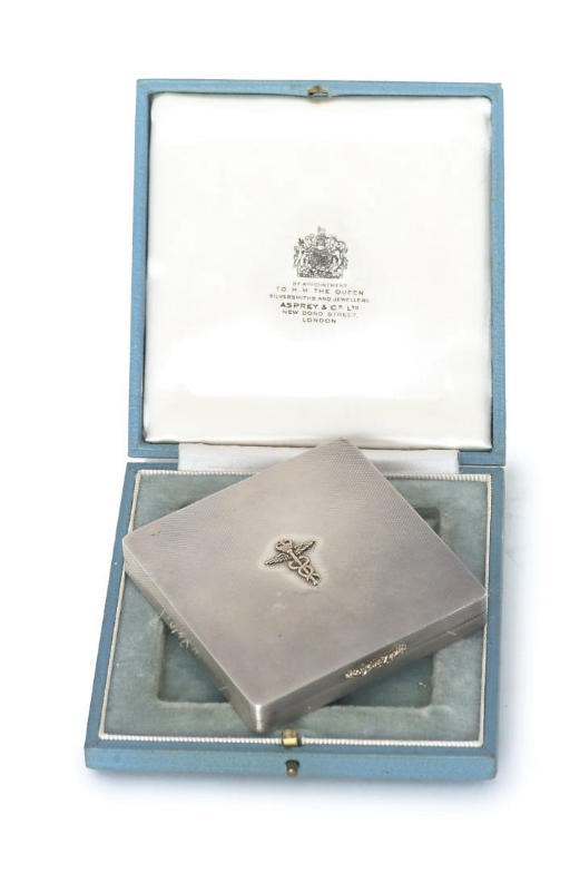 PRINCESS MARY'S COMPACT A GILT-LINED SILVER COMPACT