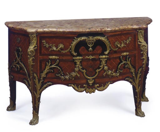 A FRENCH ORMOLU-MOUNTED MAHOGANY AND PARQUETRY COMMODE