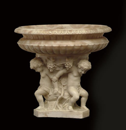 AN ITALIAN ALABASTER JARDINIERE