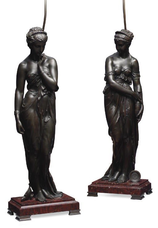 A PAIR OF FRENCH BRONZE-PATINATED SPELTER FIGURES, MOUNTED AS LAMPS