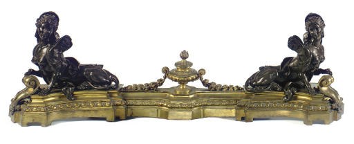 A PAIR OF FRENCH ORMOLU AND BRONZE CHENETS AND FENDER