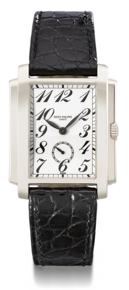 Patek Philippe. A fine and large 18K white gold rectangular wristwatch with spare dial and hands