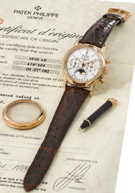 Patek Philippe. A very fine and rare 18K pink gold water-resistant perpetual calendar chronograph wristwatch with phases of the moon, original certificate and box