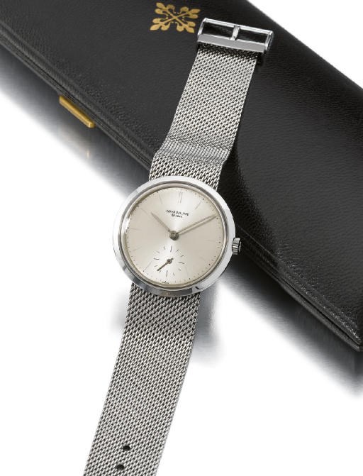 Patek Philippe. A fine, rare and unusual stainless steel water-resistant anti-magnetic "convertible" wristwatch with bracelet