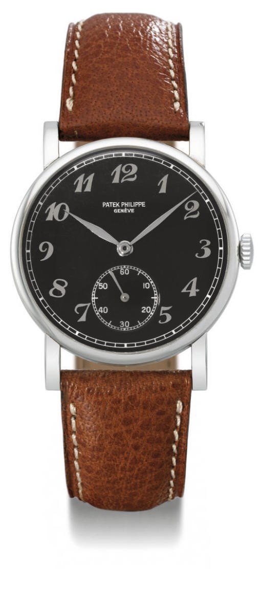 Patek Philippe. A very fine, rare and unusual stainless steel wristwatch with black dial and Breguet numerals