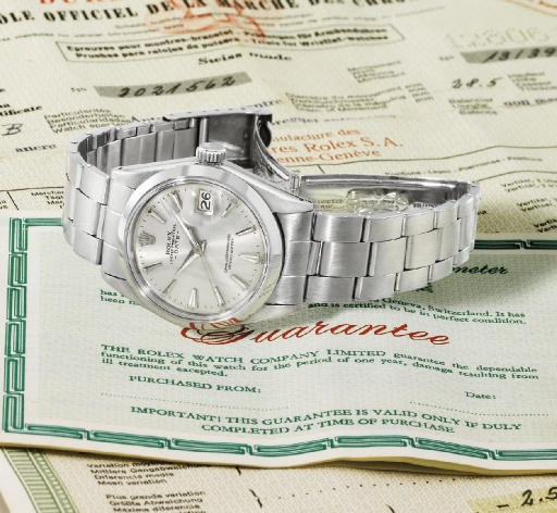 Rolex. A stainless steel self-winding water-resistant wristwatch with sweep centre seconds, date, bracelet, original guarantee and bulletin de marche