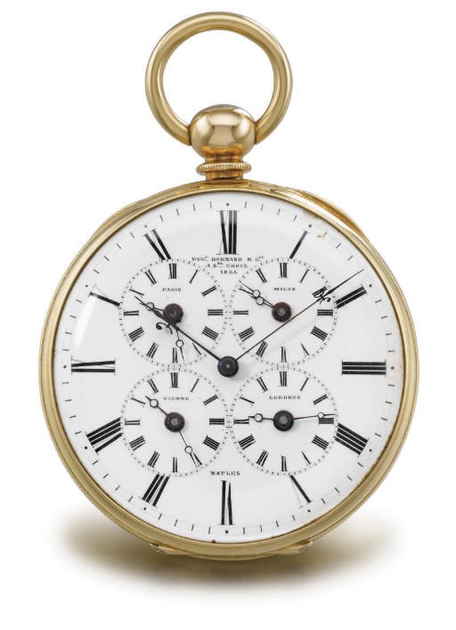 Bornand. An unusual 18K gold openface five time zones watch