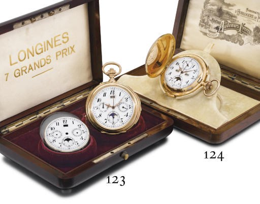 Audemars Freres. A fine 18K gold hunter case minute repeating triple calendar chronograph keyless lever watch with phases of the moon and original box