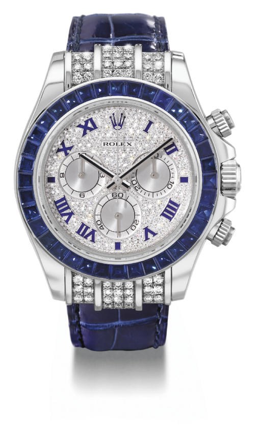 Rolex. A fine and rare 18K white gold, diamond and sapphire-set self-winding water-resistant chronograph wristwatch