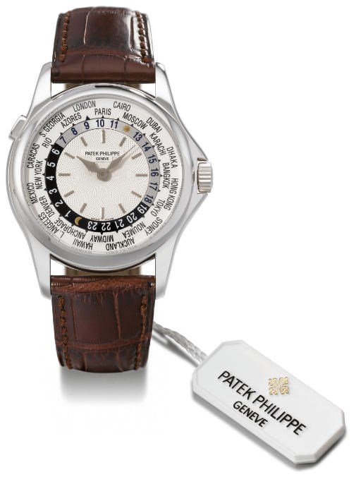 Patek Philippe. A very fine 18K white gold self-winding water-resistant World Time wristwatch