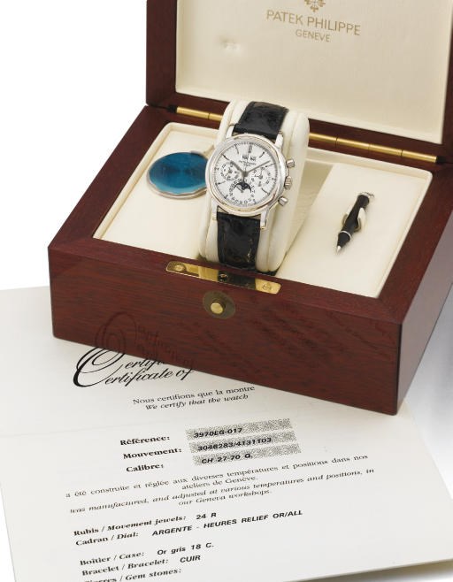 Patek Philippe. A very fine and rare 18K white gold water-resistant perpetual calendar chronograph wristwatch with phases of the moon, original certificate and box