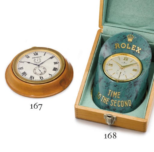 Movado. An extremely rare brass openface keyless lever deck chronometer with hack feature, up and down indicator, especially made for timing contests, with "Class A Especially Good Kew A Certificate", Neuchâtel Observatory Bulletin de Marche and wooden display box