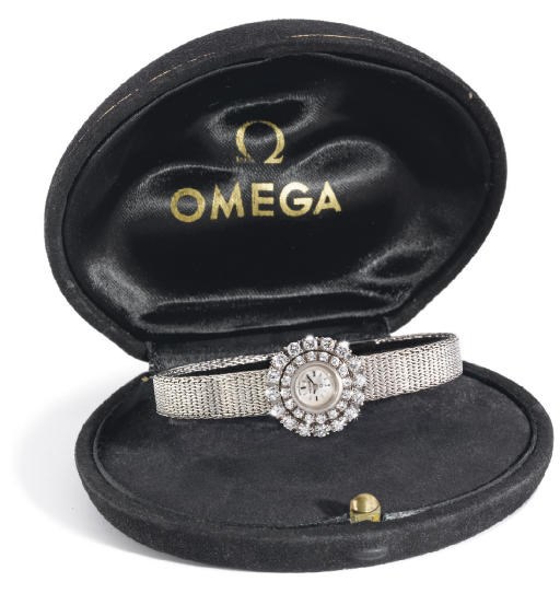 Omega. An 18K white gold & diamond-set ladies backwound bracelet watch with box