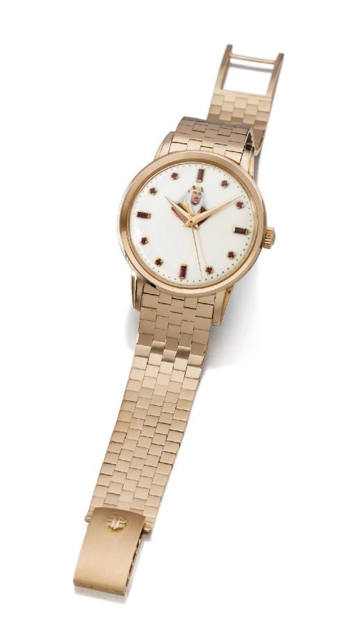 Patek Philippe. An extremely fine, large and rare 18K pink gold wristwatch with sweep centre seconds and bracelet, the ruby-set enamel dial with the portrait of King Ibn Saud