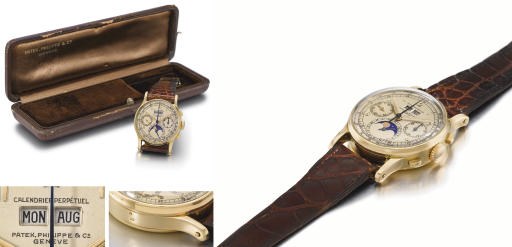 Patek Philippe. A superb and extremely rare 18K gold perpetual calendar chronograph wristwatch with phases of the moon, original box and special dial