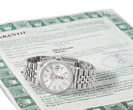 Rolex. An unusual stainless steel self-winding water-resistant wristwatch with sweep centre seconds, date, bracelet and original guarantee, made for the Sultanate of Oman