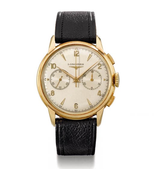Longines. A large 18K gold chronograph wristwatch