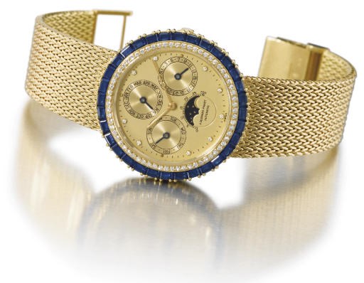 Audemars Piguet. A fine and unusual 18K gold, diamond and sapphire-set self-winding perpetual calendar wristwatch with phases of the moon and bracelet