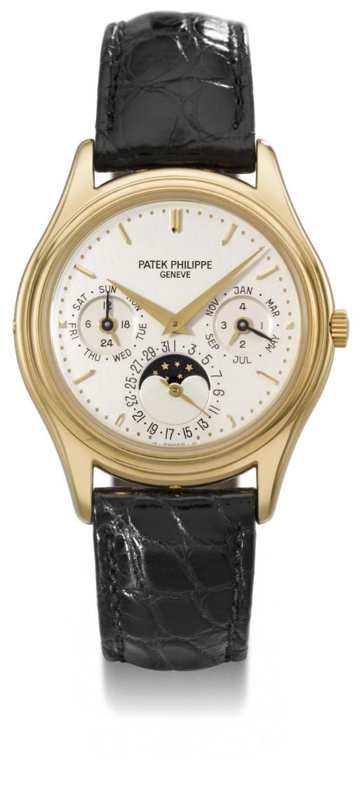 Patek Philippe. A fine 18K gold self-winding perpetual calendar wristwatch with phases of the moon