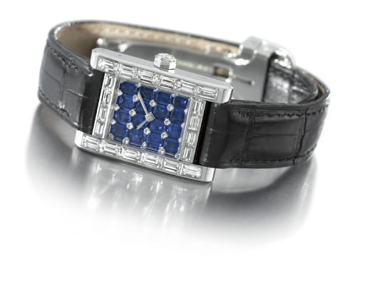 Cartier. A fine and rare 18K white gold, diamond and sapphire-set rectangular wristwatch