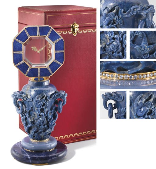 Cartier. An exceptional and unique 18K white and yellow gold, silver, diamond, rock crystal, lapis lazuli, mother-of-pearl, marble and chalcedony 8-day Mystery clock