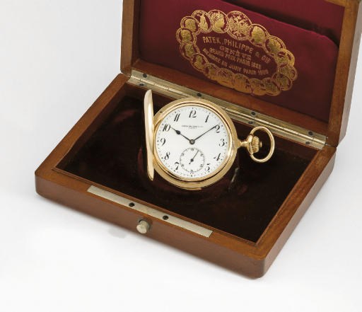 Patek Philippe. A fine 18K gold hunter case minute repeating keyless lever watch