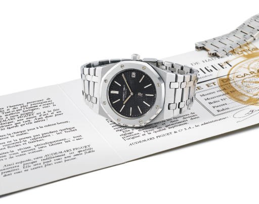 Audemars Piguet. A fine and large stainless steel self-winding water-resistant wristwatch with date, bracelet, original certificate and a spare bracelet