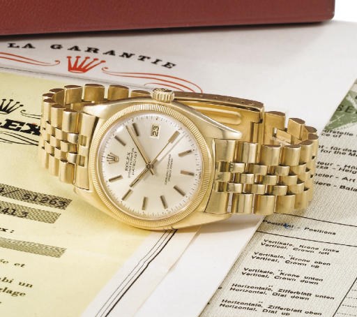 Rolex. An 18K gold self-winding water-resistant wristwatch with date, sweep centre seconds, bracelet, original certificate, bulletin de marche and box