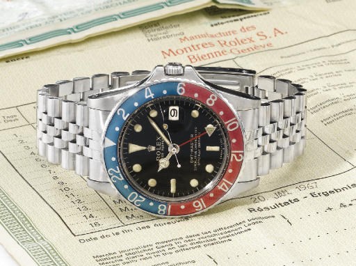 Rolex. A stainless steel self-winding water-resistant dual time wristwatch with sweep centre seconds, date, original guarantee and bulletin de marche