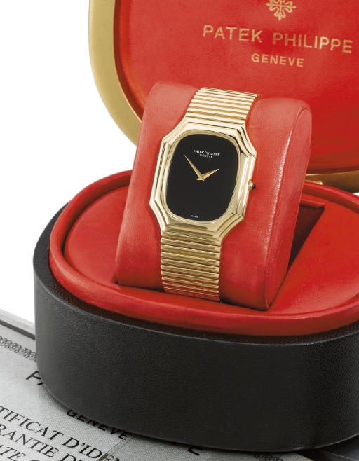 Patek Philippe. An unusual 18K gold rectangular-shaped wristwatch with onyx dial, bracelet, original certificate and box