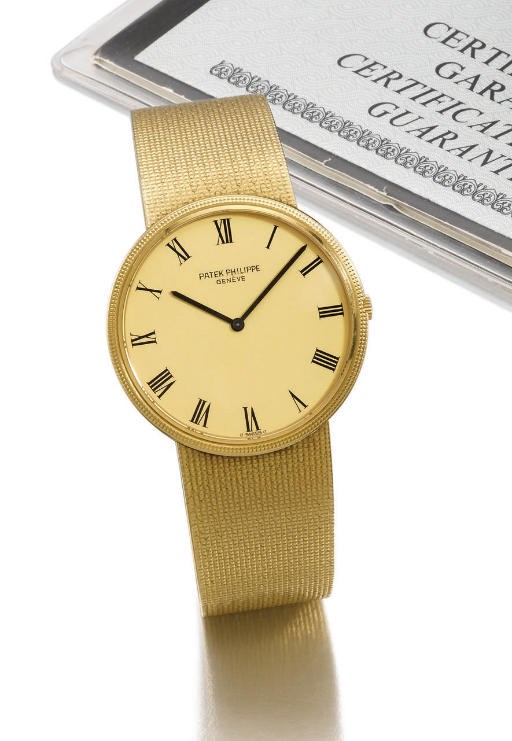 Patek Philippe. A fine 18K gold self-winding wristwatch with bracelet