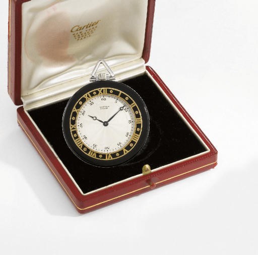 Cartier. A fine and rare 18K gold, platinum, black onyx, enamel and diamond-set openface keyless lever dress watch with box