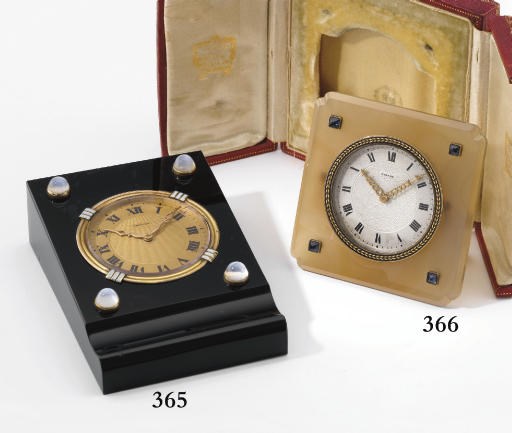 Cartier. A very fine 18K gold, agate, enamel and sapphire-set Art Deco desk clock with original box