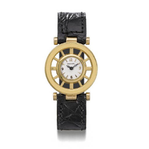 Cartier. A fine, rare and unusual 18K gold backwound Helm wristwatch