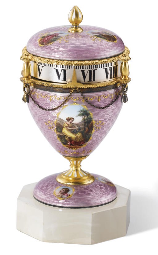 Swiss. A small gilt-metal and enamel urn-shaped clock