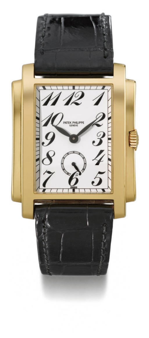 Patek Philippe. A large 18K gold rectangular wristwatch